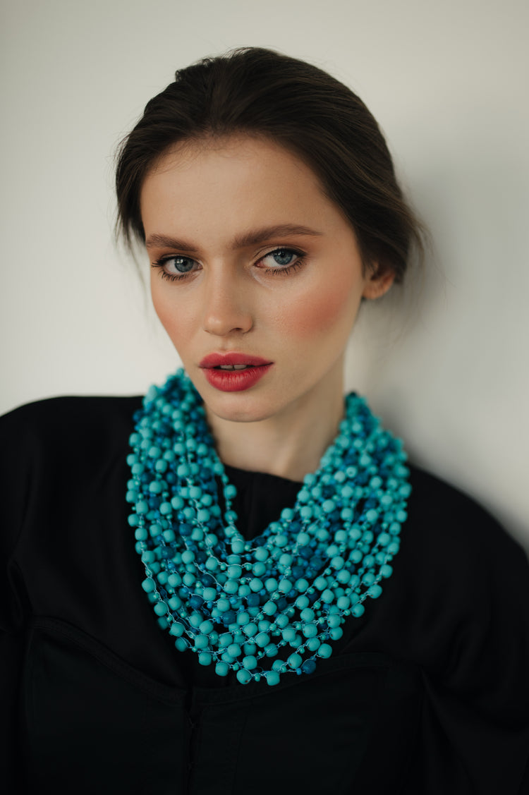 Necklace in the color of a sea wave or a mountain glacier