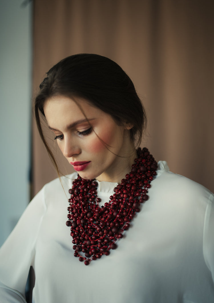 Necklace in the color of ripe cherries or aged wine
