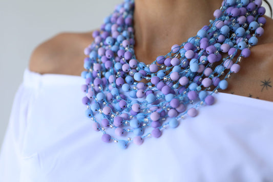 Delicate blue-violet necklace of frosted beads