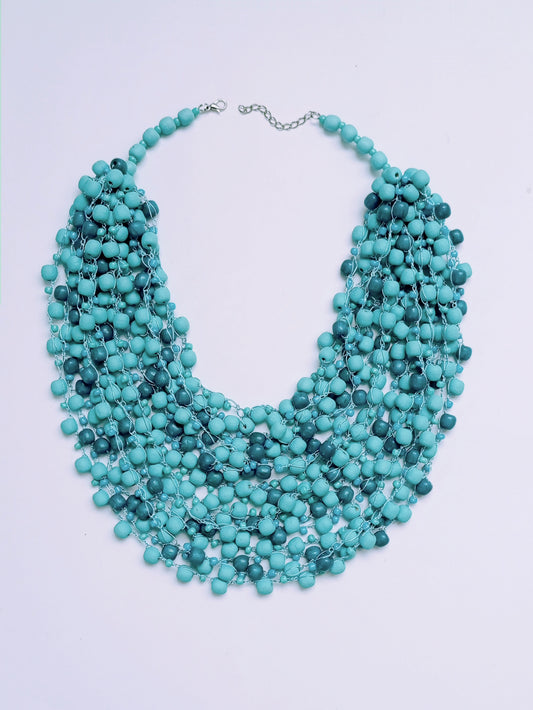 Necklace in the color of a sea wave or a mountain glacier