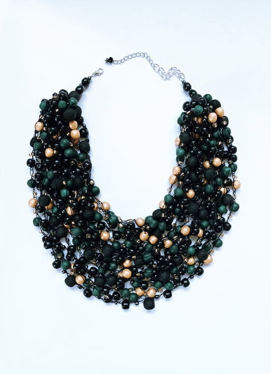 Evening necklace of matte and glossy beads