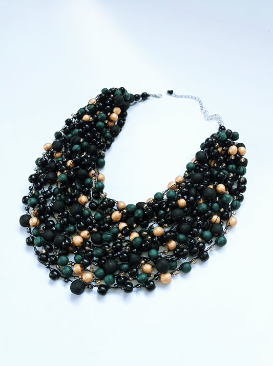 Evening necklace of matte and glossy beads