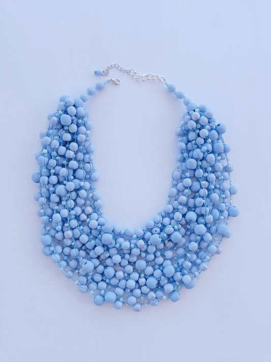 Matte blue necklace with beads of different sizes