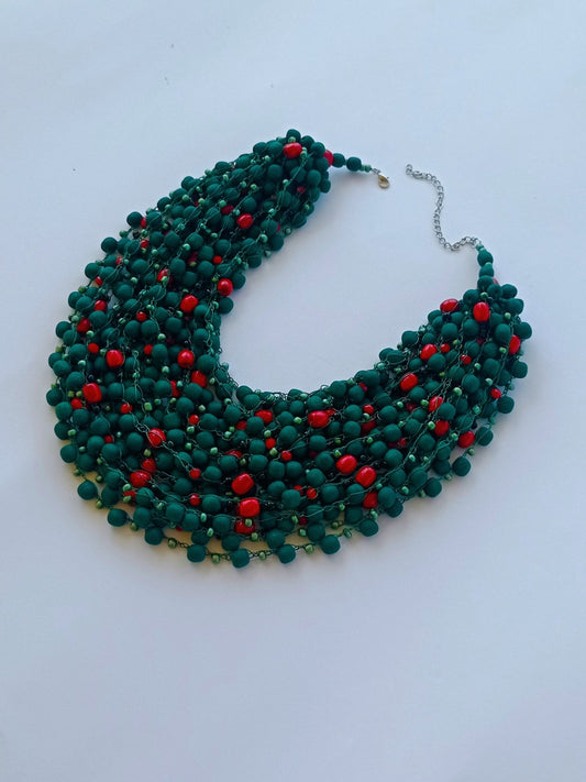 A matte bead necklace with occasional glossy beads resembles a barberry branch - stvoreno